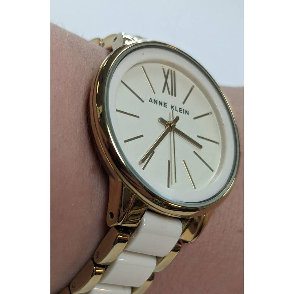 Anne Klein Two Tone White and Golden Sectioned Wrist Watch Roman Numeral